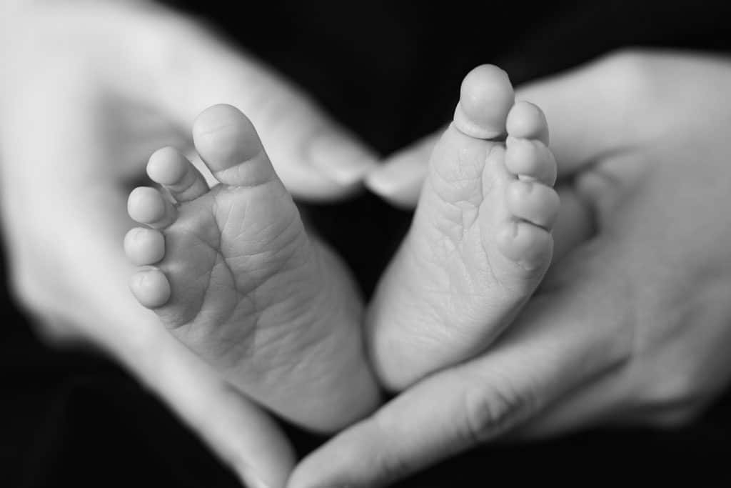 newborn feet black and white