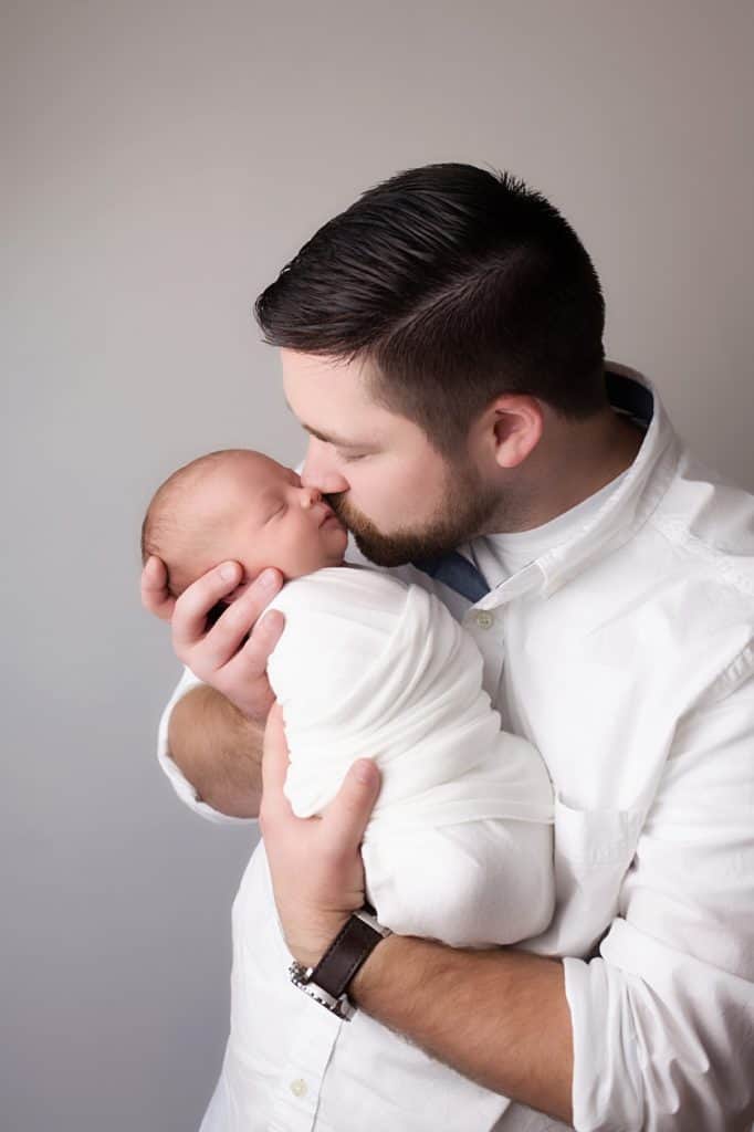 dad with newborn