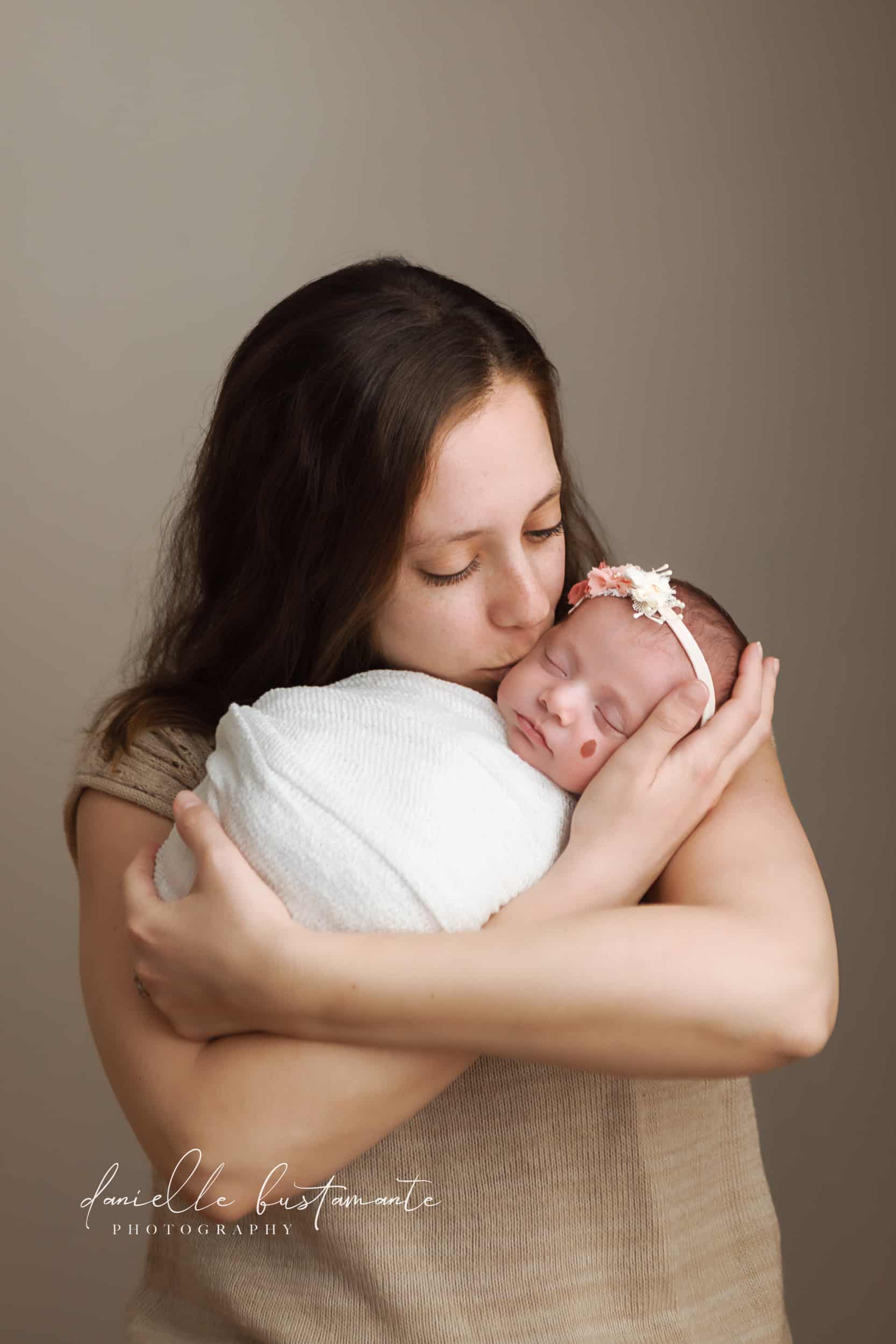 Windham-NH-Newborn-Mother-Kissing-Baby