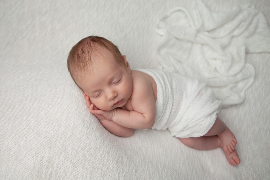 Baby AJ Side Pose on ivory backdrop