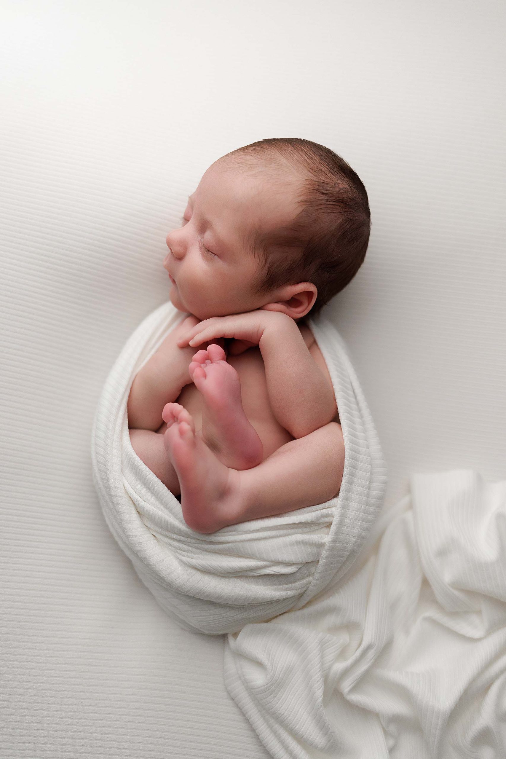 Boston Newborn Photographer - Baby in ivory swaddle